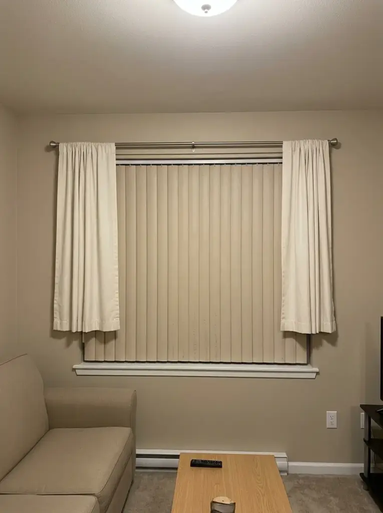 Hang Curtains High to Make Windows Look Larger