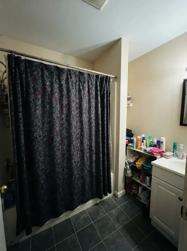 Replace a bulky shower curtain with a lighter one
