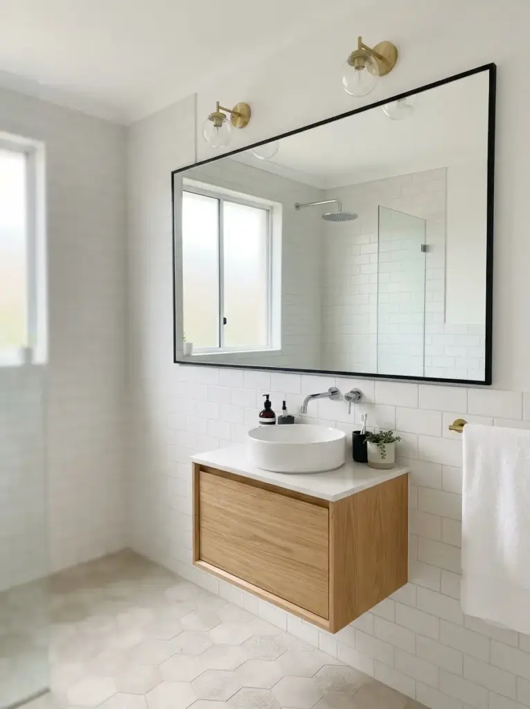 Use one large mirror instead of several tiny pieces